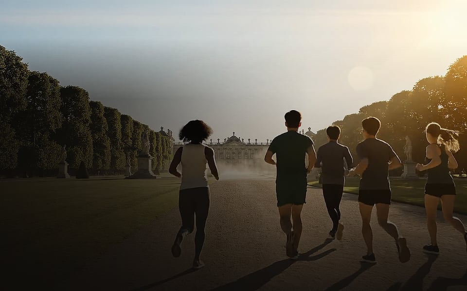 Atelier Fitness Events website hero — runners on the Grand Canal at Versailles at dawn